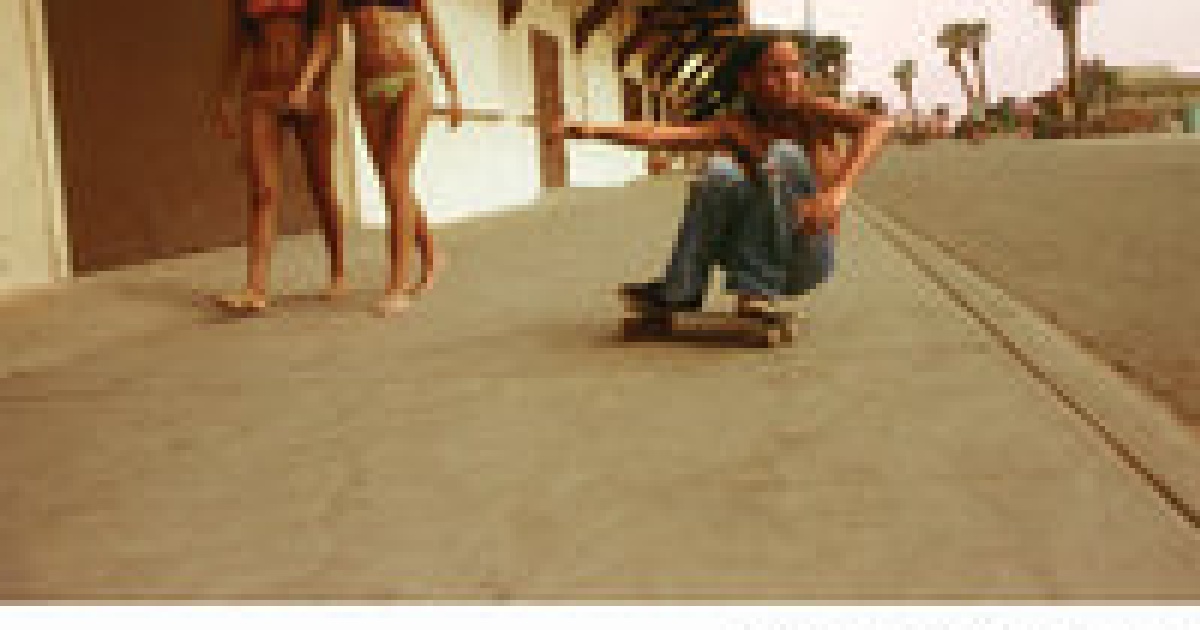 Hugh Holland, Sidewalk Surfer, Huntington Beach, 1976